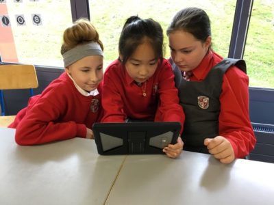 Children looking at iPad Children looking at iPad
